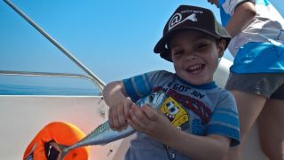 https://www.portoroz.si:443/de/imagelib/object/default/2017/dozivetja/child-fishing-slovenia-sea.jpg